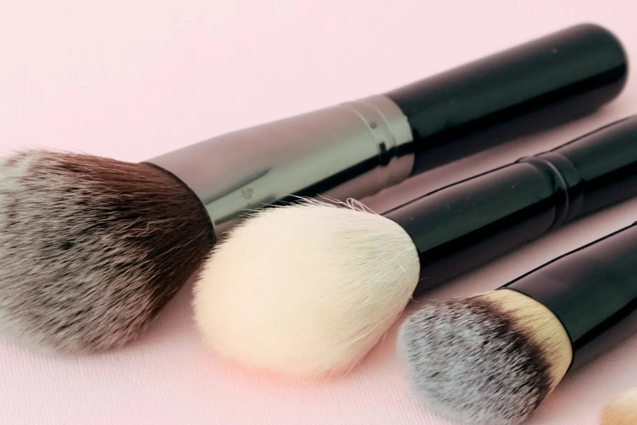 Makeup brushes on a soft pink background for Jamila's SHEGLAM Egypt buying guide