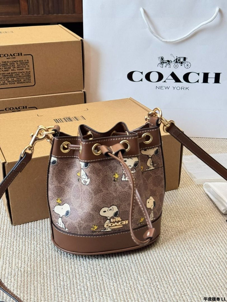 Coach X Peanuts Mini Dempsey Bucket Bag in signature canvas