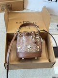 Coach X Peanuts Mini Dempsey Bucket Bag in signature canvas
