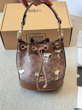 Load image into Gallery viewer, Coach X Peanuts Mini Dempsey Bucket Bag in signature canvas