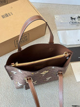 Load image into Gallery viewer, Coach x Peanuts Mollie Tote 25 in signature canvas with a Snoopy print