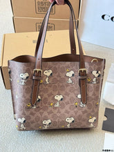 Load image into Gallery viewer, Coach x Peanuts Mollie Tote 25 in signature canvas with a Snoopy print