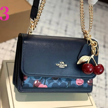 Load image into Gallery viewer, Klare Crossbody Bag In Signature Canvas With Cherry Print (without charm)