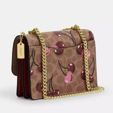 Load image into Gallery viewer, Klare Crossbody Bag In Signature Canvas With Cherry Print (without charm)